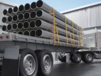 Semi Truck With Large Load Of Pipe